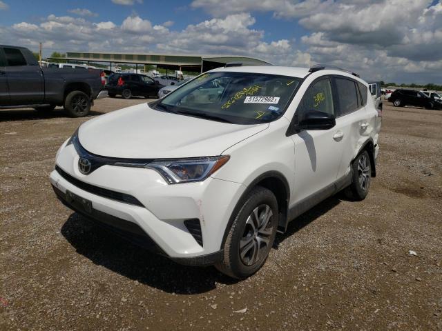 Photo 2 from auction – 2017 TOYOTA RAV4 LE with VIN JTMZFREV7HJ701154