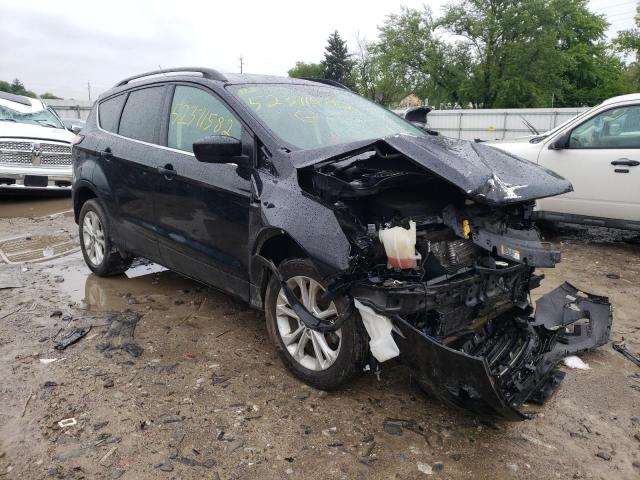 FORD ESCAPE SE 2018 with VIN 1FMCU9GD0JUC50035 - Photo from auction