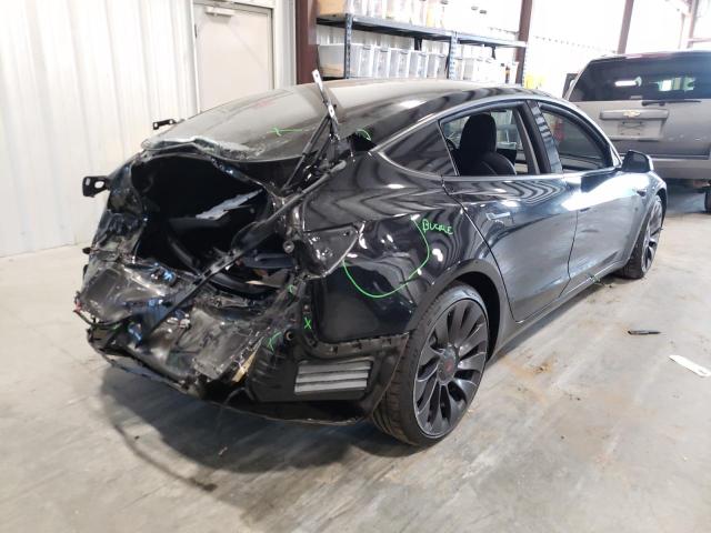 Photo 4 from auction – 2021 TESLA MODEL 3 with VIN 5YJ3E1EC3MF913611
