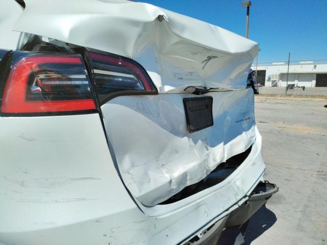 Photo 9 from auction – 2021 TESLA MODEL Y with VIN 5YJYGDEE7MF065591