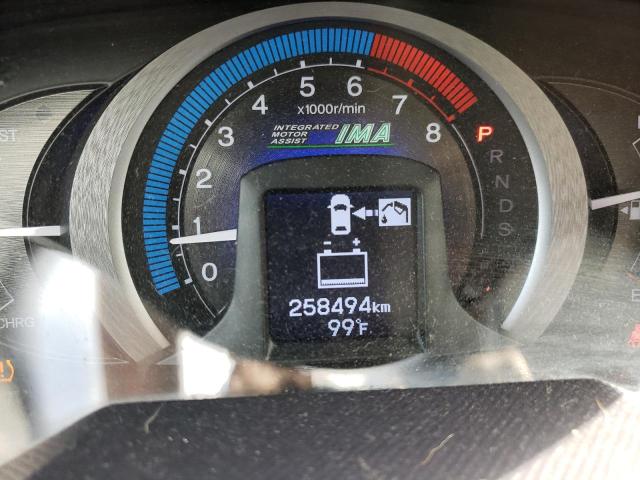 Photo 8 from auction – 2010 HONDA INSIGHT EX with VIN JHMZE2H77AS042658
