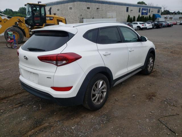 Photo 4 from auction – 2018 HYUNDAI TUCSON SEL with VIN KM8J3CA47JU700439