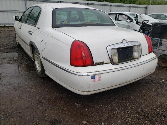 Photo 3 from auction – 2000 LINCOLN TOWN CAR E with VIN 1LNHM81W4YY887149