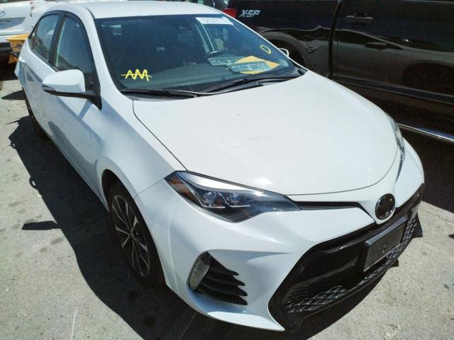 TOYOTA COROLLA L 2019 with VIN 2T1BURHEXKC194756 - Photo from auction