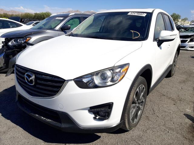Photo 2 from auction – 2016 MAZDA CX-5 GT with VIN JM3KE2DY3G0756946