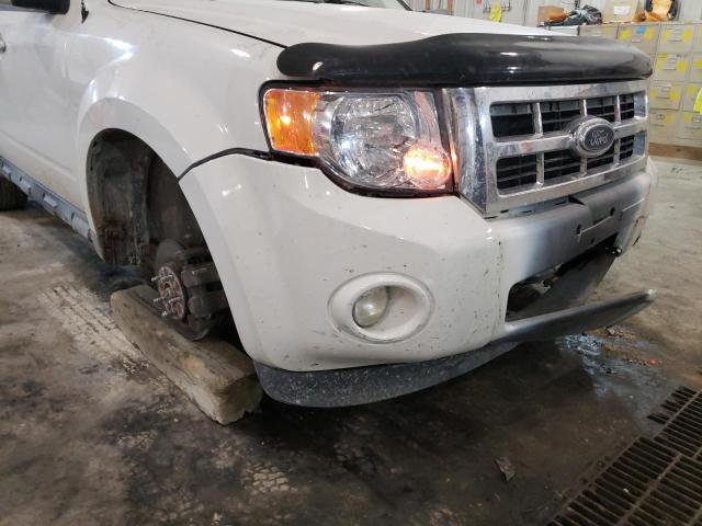 Photo 9 from auction – 2011 FORD ESCAPE LIM with VIN 1FMCU0EG7BKB66221