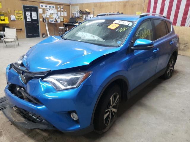 Photo 2 from auction – 2017 TOYOTA RAV4 XLE with VIN JTMRFREV1HJ165186