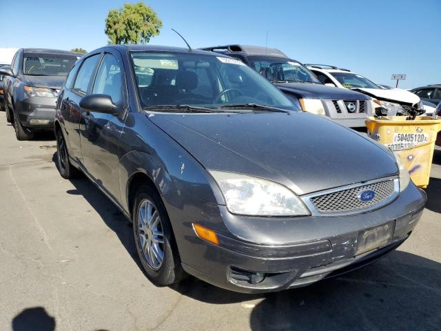 FORD FOCUS 2005 with VIN 3FAFP37N75R123154 - Photo from auction