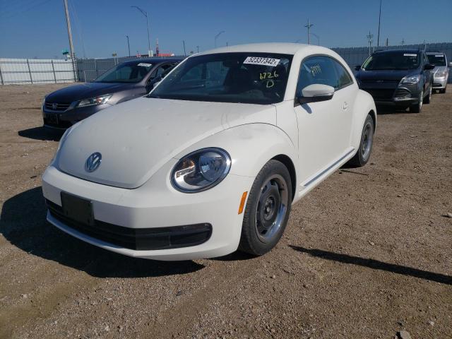 Photo 2 from auction – 2012 VOLKSWAGEN BEETLE with VIN 3VWJP7AT6CM606726