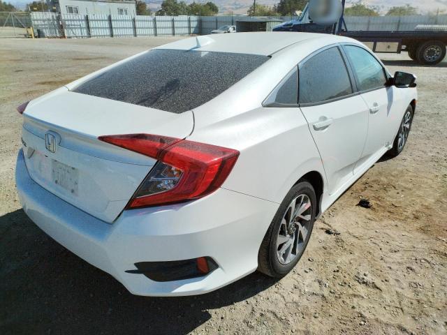 Photo 4 from auction – 2018 HONDA CIVIC EX with VIN 19XFC2F77JE208242