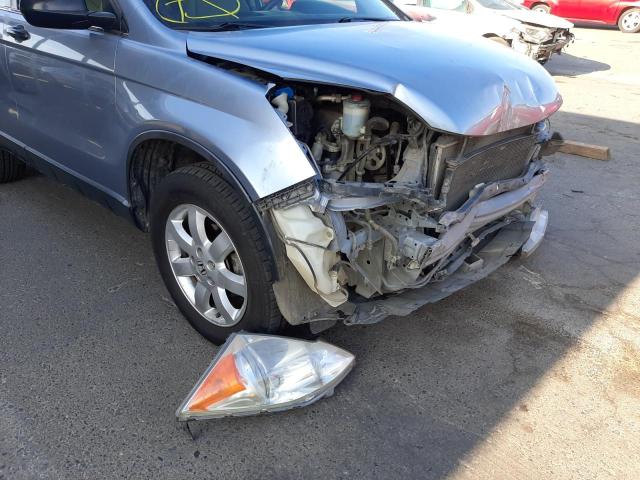 Photo 9 from auction – 2011 HONDA CR-V SE with VIN JHLRE3H41BC014771