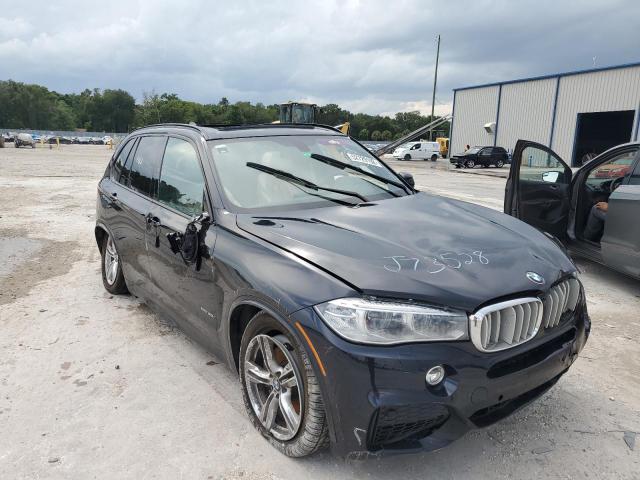 BMW X5 XDRIVE5 2014 with VIN 5UXKR6C57E0J73528 - Photo from auction