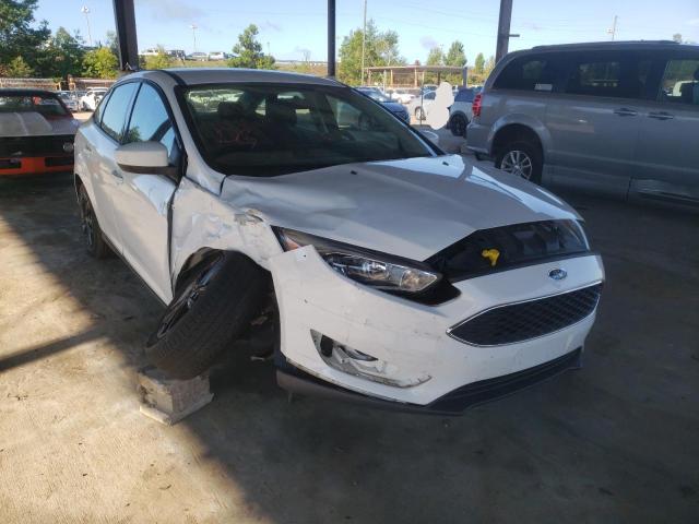 FORD FOCUS SE 2018 with VIN 1FADP3F27JL213038 - Photo from auction