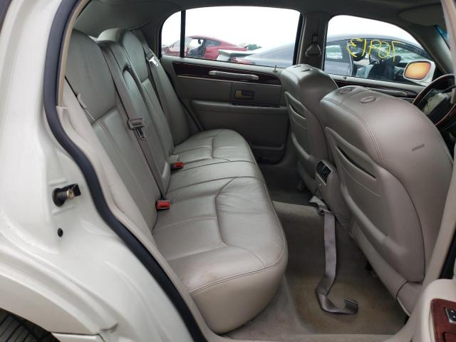 Photo 6 from auction – 2004 LINCOLN TOWN CAR U with VIN 1LNHM83W44Y647266