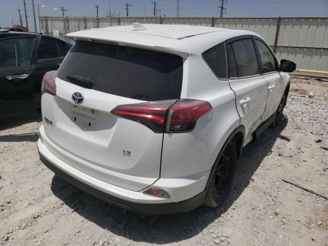 Photo 4 from auction – 2018 TOYOTA RAV4 LE with VIN JTMZFREV4JJ197989
