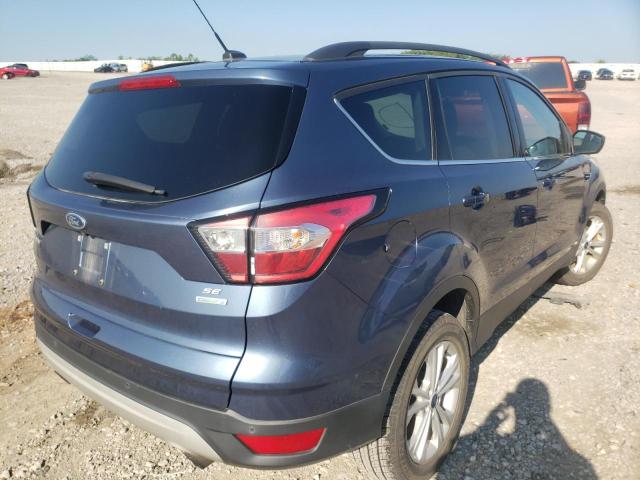 Photo 4 from auction – 2018 FORD ESCAPE SE with VIN 1FMCU0GD1JUC90670