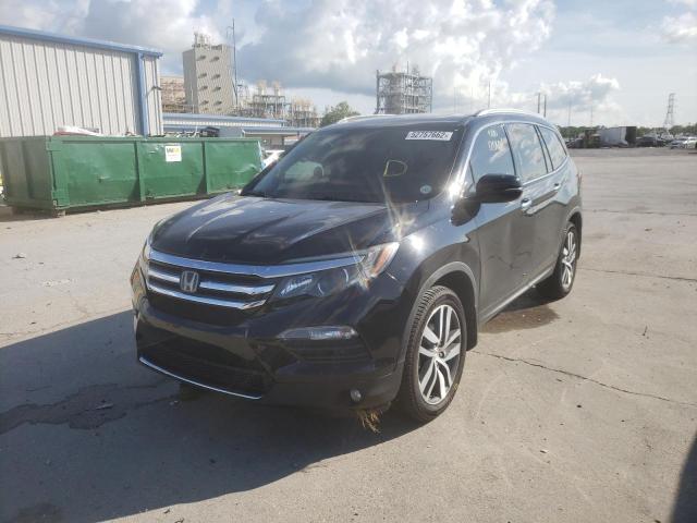 Photo 2 from auction – 2017 HONDA PILOT TOUR with VIN 5FNYF5H92HB042572