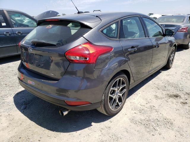 Photo 4 from auction – 2018 FORD FOCUS SEL with VIN 1FADP3M27JL211826