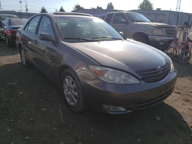 TOYOTA CAMRY LE 2004 with VIN 4T1BF30K04U583027 - Photo from auction