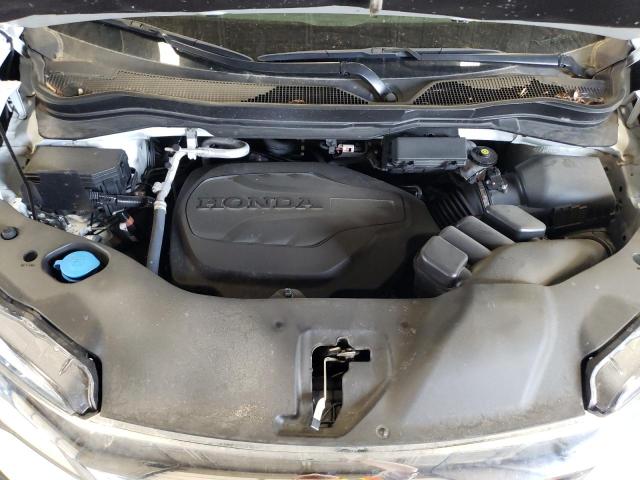 Photo 7 from auction – 2021 HONDA PILOT TOUR with VIN 5FNYF6H65MB091786