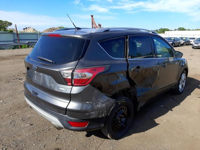 Photo 4 from auction – 2017 FORD ESCAPE TIT with VIN 1FMCU9J93HUB34567