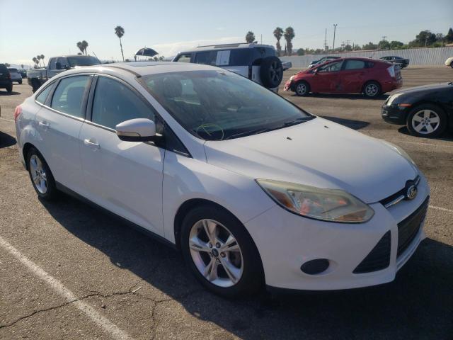 FORD FOCUS SE 2014 with VIN 1FADP3F24EL225461 - Photo from auction