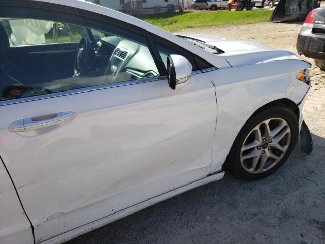 Photo 9 from auction – 2014 FORD FUSION SE with VIN 3FA6P0H77ER257385