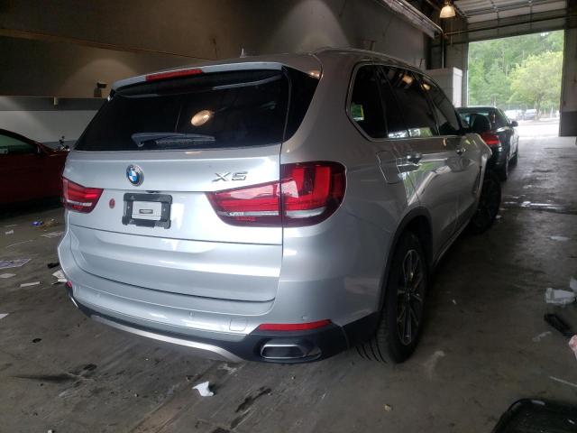 Photo 4 from auction – 2018 BMW X5 XDRIVE3 with VIN 5UXKR0C5XJ0X97556