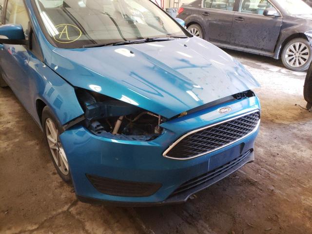 Photo 9 from auction – 2015 FORD FOCUS SE with VIN 1FADP3K21FL384056