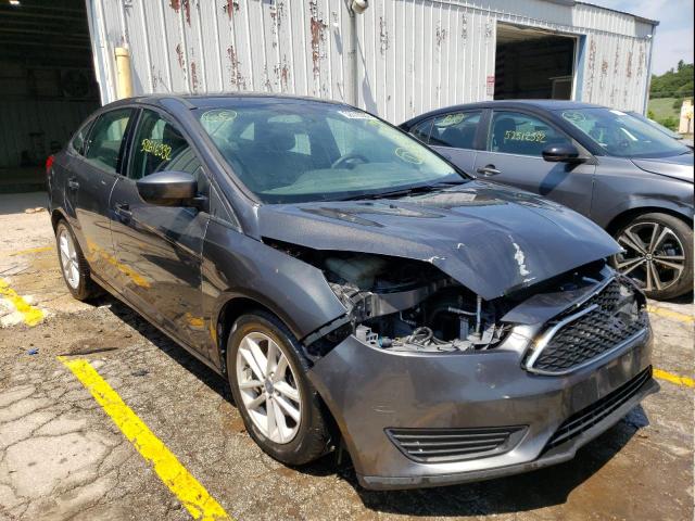 FORD FOCUS SE 2018 with VIN 1FADP3FE2JL221459 - Photo from auction