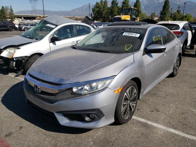 Photo 2 from auction – 2017 HONDA CIVIC EX with VIN 2HGFC1F40HH658248