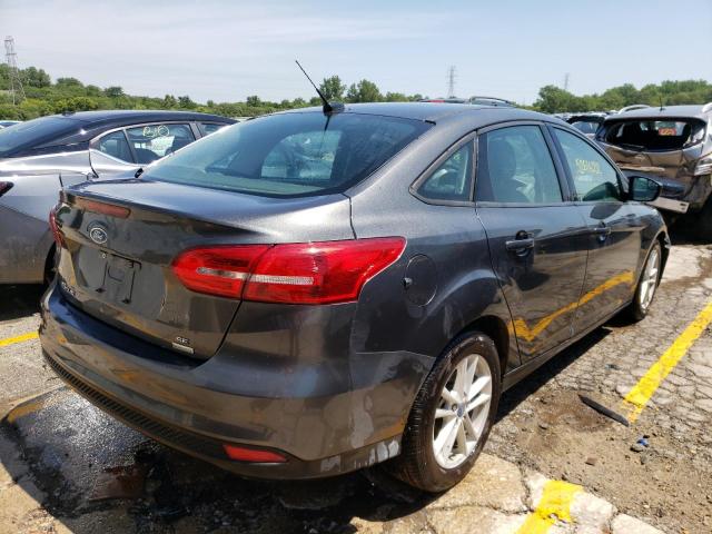 Photo 4 from auction – 2018 FORD FOCUS SE with VIN 1FADP3FE2JL221459