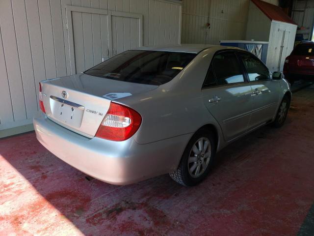 Photo 4 from auction – 2002 TOYOTA CAMRY LE with VIN 4T1BE30KX2U570415