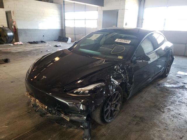 Photo 2 from auction – 2021 TESLA MODEL 3 with VIN 5YJ3E1EBXMF031438