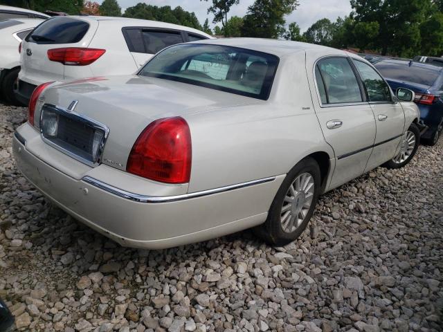 Photo 4 from auction – 2004 LINCOLN TOWN CAR U with VIN 1LNHM83W64Y684884