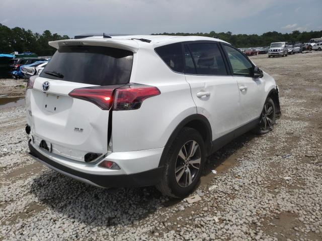Photo 4 from auction – 2017 TOYOTA RAV4 XLE with VIN JTMWFREV3HD102608