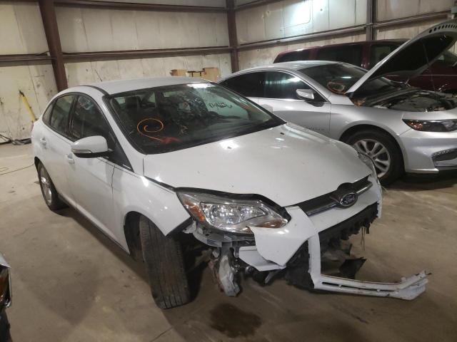 FORD FOCUS SE 2014 with VIN 1FADP3F23EL285960 - Photo from auction