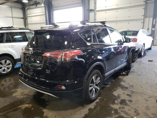 Photo 4 from auction – 2016 TOYOTA RAV4 XLE with VIN 2T3RFREV2GW496245
