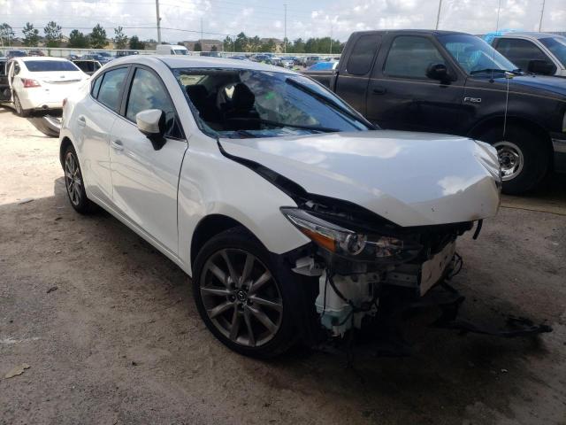 MAZDA 3 TOURING 2018 with VIN 3MZBN1V34JM209997 - Photo from auction