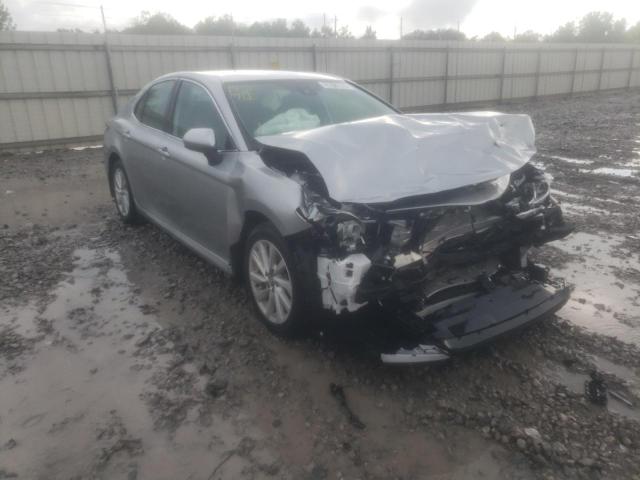 TOYOTA CAMRY LE 2022 with VIN 4T1C11AK2NU650816 - Photo from auction