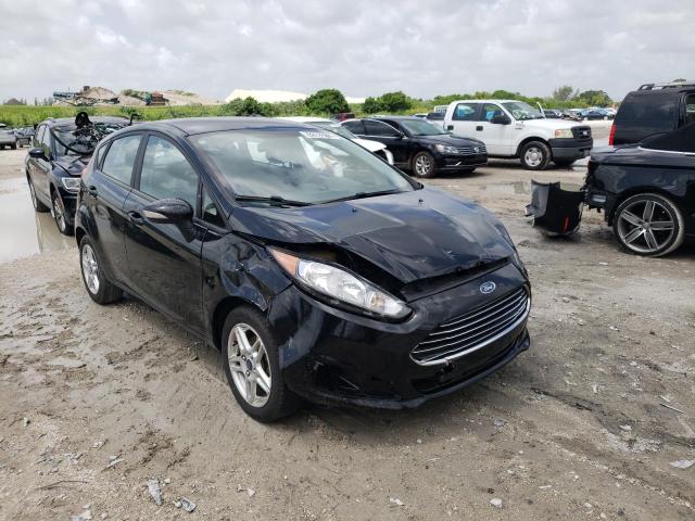FORD FIESTA SE 2018 with VIN 3FADP4EJ0JM138082 - Photo from auction