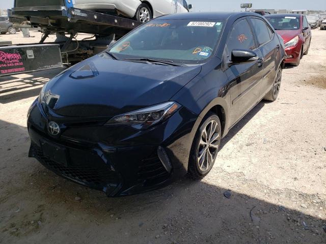 Photo 2 from auction – 2017 TOYOTA COROLLA L with VIN 5YFBURHE5HP675085