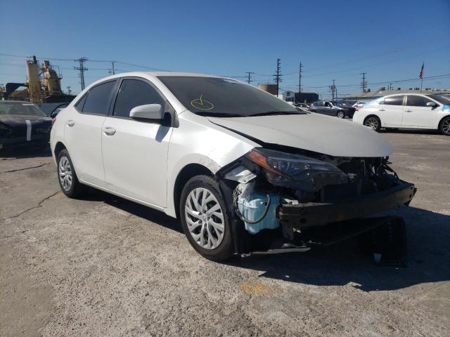 TOYOTA COROLLA L 2017 with VIN 5YFBURHE9HP696540 - Photo from auction