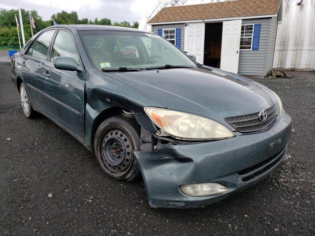 TOYOTA CAMRY LE 2004 with VIN 4T1BE30K94U335023 - Photo from auction