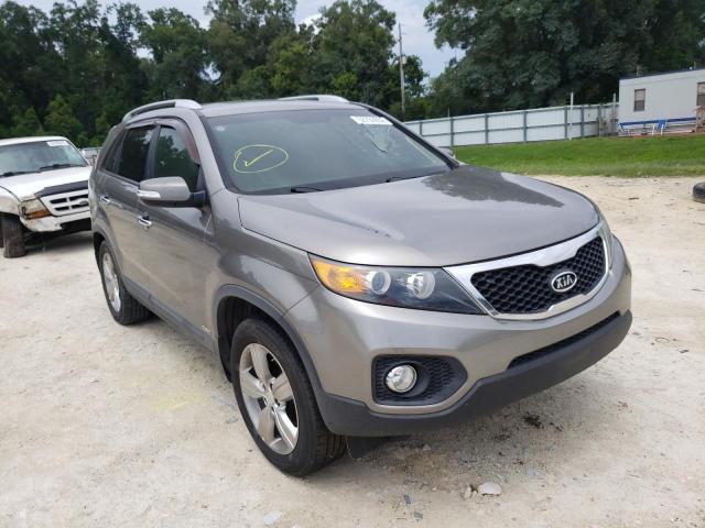 KIA SORENTO EX 2013 with VIN 5XYKUDA27DG384945 - Photo from auction