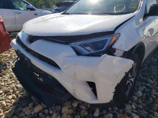 Photo 9 from auction – 2018 TOYOTA RAV4 LE with VIN JTMBFREV6JD249882