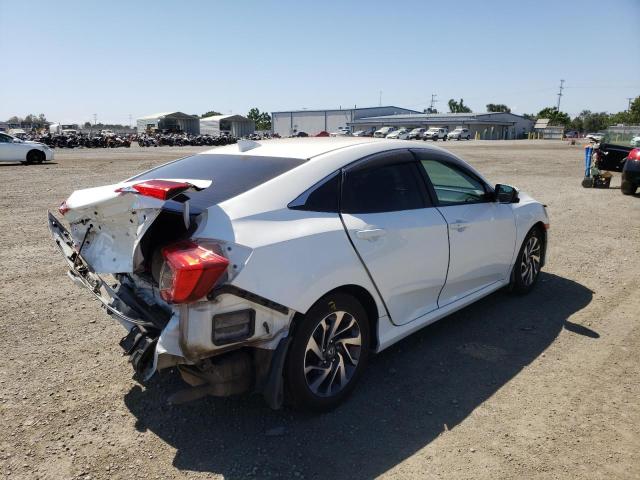 Photo 4 from auction – 2018 HONDA CIVIC EX with VIN 19XFC2F79JE205424