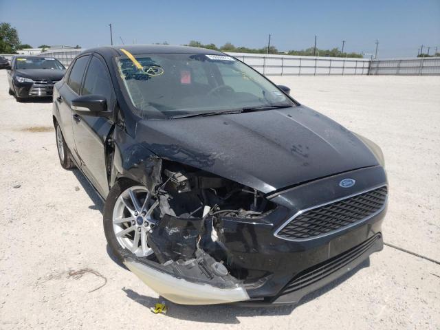 FORD FOCUS SE 2015 with VIN 1FADP3F24FL367987 - Photo from auction