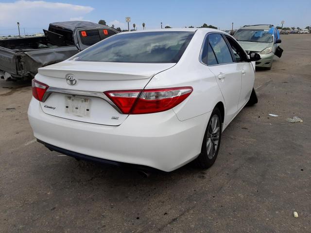 Photo 4 from auction – 2016 TOYOTA CAMRY LE with VIN 4T1BF1FK0GU165454