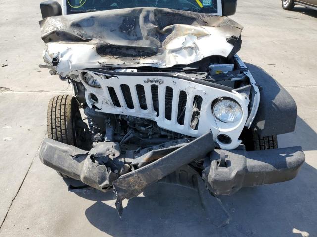 Photo 7 from auction – 2015 JEEP WRANGLER U with VIN 1C4BJWDG7FL663041